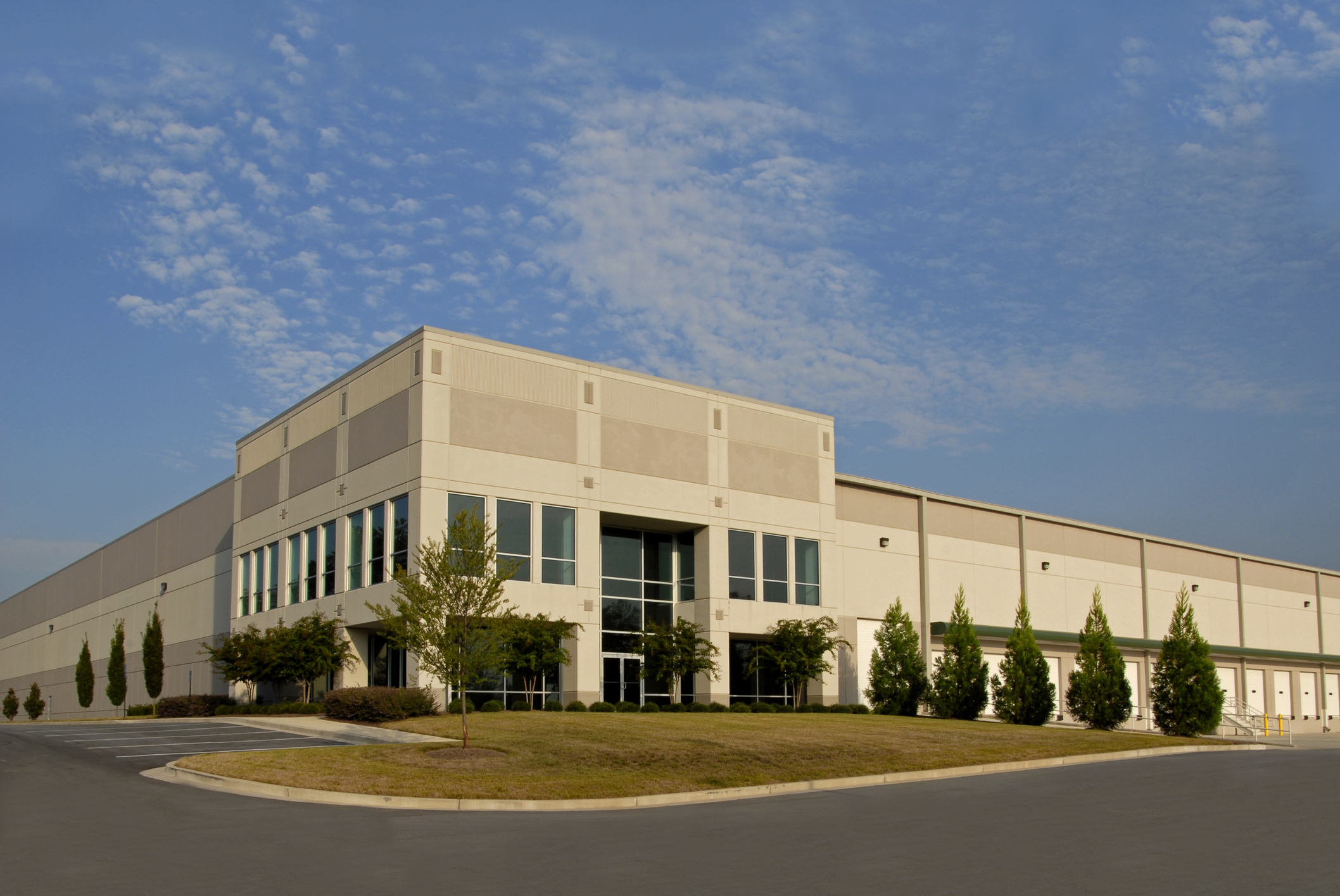 Industrial Building with Clouds